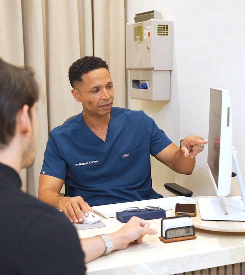 Dr. Nathan Curran in his practice at Biolite Clinic Dubai