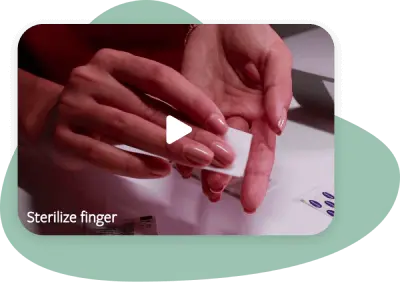 Woman sterilizing finger with alcohol